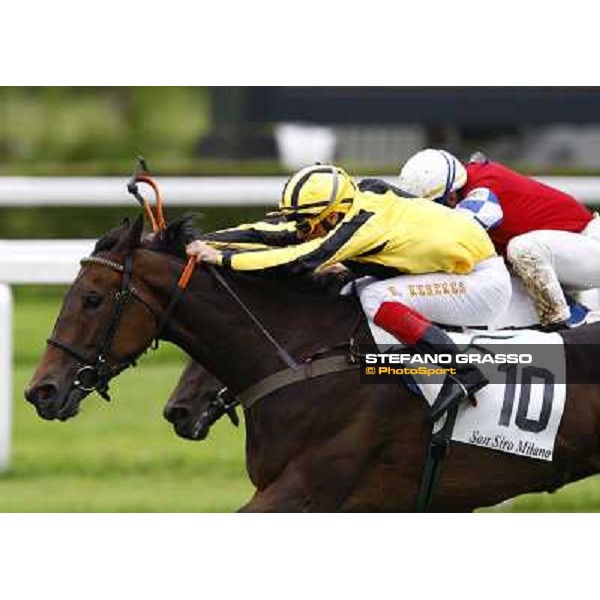 Karoly Kerekes on Rockatella goes to win the LXXVII Royal Mares beating Umberto Rispoli on Sakheart Milan, San Siro racetrack, 20th june 2010 ph. Stefano Grasso