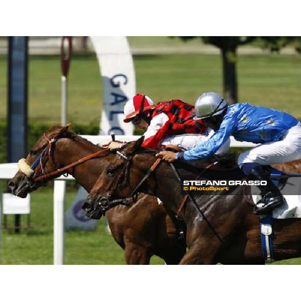 Cristian Demuro on Moonlight Red wins the Premio Mantovani beating Fabio Branca on Paris to Peking Milan - San Siro racetrack, 4th july 2010 ph. Stefano Grasso