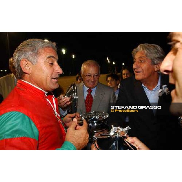 giving prize for Coppa dell\' Allevamento filly Mauro Biasuzzi with father Giuseppe and Tino Cazzaniga, at right Treviso, Sant Artemio racetrack 19th september 2004 ph. Stefano Grasso