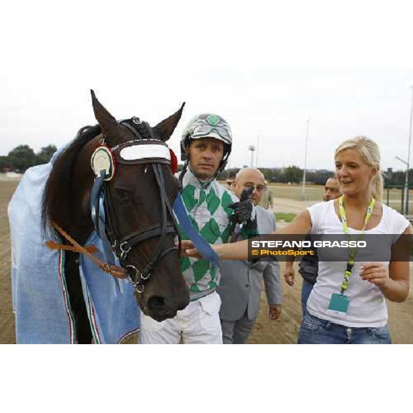 Andrea Guzzinati, Nadir Kronos and his groom parading after winning the 83¡ Italian Trotting Derby Roma, 10th oct. 2010 ph. Stefano Grasso