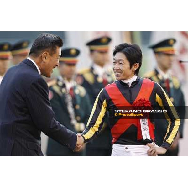 Yutaka Take and the owner of Rose Kingdom during the prize giving ceremony Tokyo- Fuchu racecourse, 28th nov. 2010 ph. Stefano Grasso