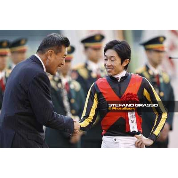 Yutaka Take and the owner of Rose Kingdom during the prize giving ceremony Tokyo- Fuchu racecourse, 28th nov. 2010 ph. Stefano Grasso