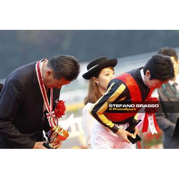 Yutaka Take and the owner of Rose Kingdom during the prize giving ceremony Tokyo- Fuchu racecourse, 28th nov. 2010 ph. Stefano Grasso