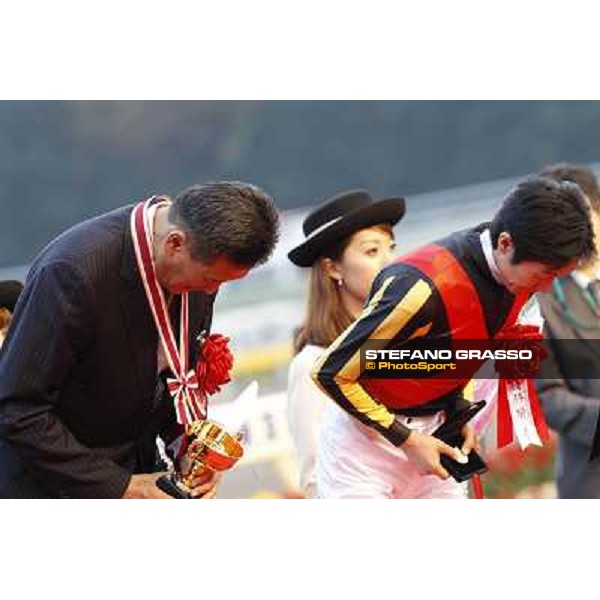 Yutaka Take and the owner of Rose Kingdom during the prize giving ceremony Tokyo- Fuchu racecourse, 28th nov. 2010 ph. Stefano Grasso
