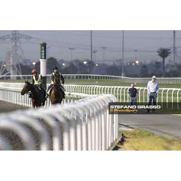 Morning track works at Meydan - John Gosden (right white cap) looking William Buick on Utley and Tazeez Dubai - Meydan 24th march 2011 ph.Stefano Grasso