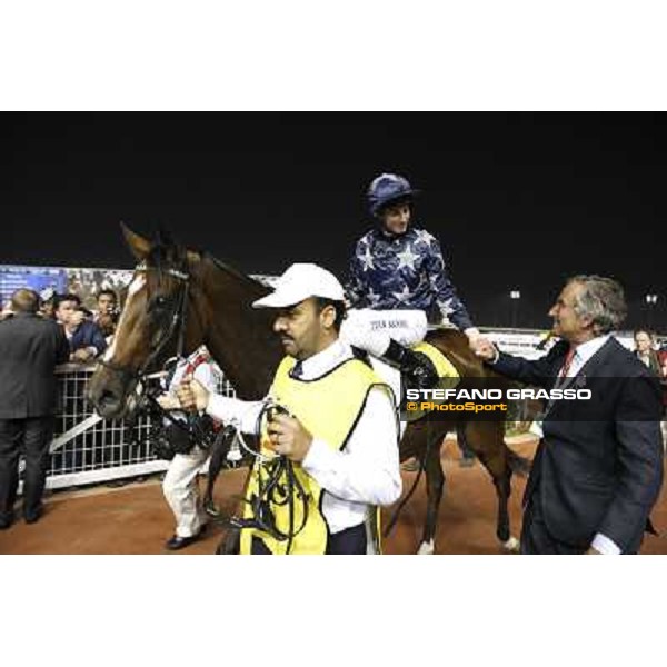 Luca Cumani congratulatres with Ryan Moore and Presvis after winning the Dubai Duty Free Dubai - Meydan, 26th march 2011 ph.Stefano Grasso