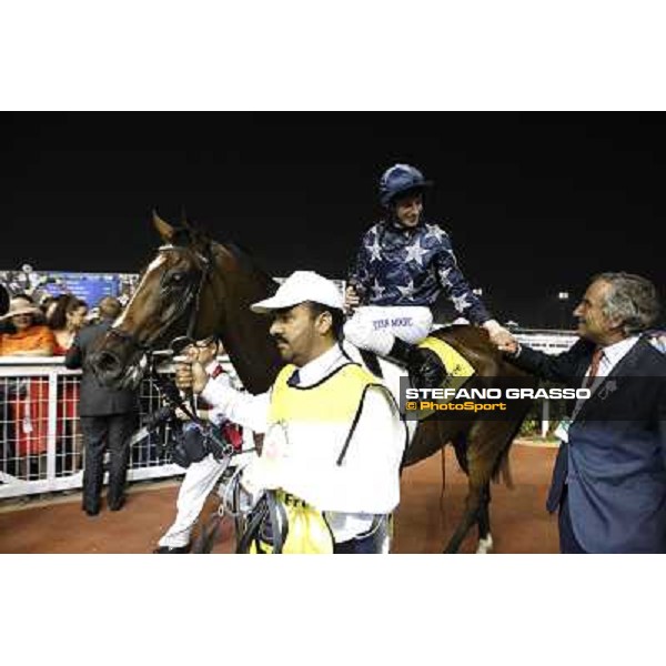 Luca Cumani congratulatres with Ryan Moore and Presvis after winning the Dubai Duty Free Dubai - Meydan, 26th march 2011 ph.Stefano Grasso