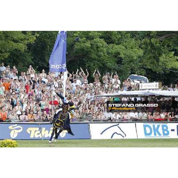 Andre Thieme on Nacorde celebrates after winning the Deutsches Spring-Derby Hamburg, 5th june 2011 ph.Stefano Grasso