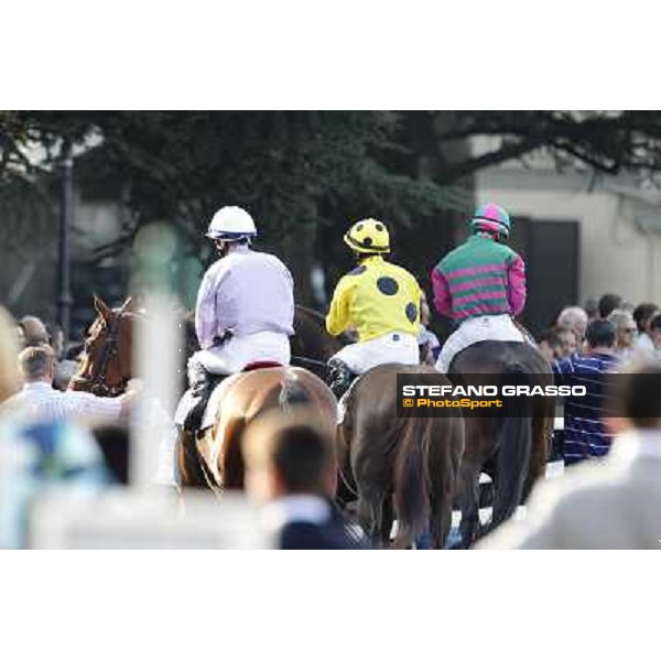Mirco Demuro on Khor Sheed and Umberto Rispoli on Adamantina parade before the start of the Premio Sergio Cumani Milano - San Siro racetrack, 24th sept.2011 ph.Stefano Grasso