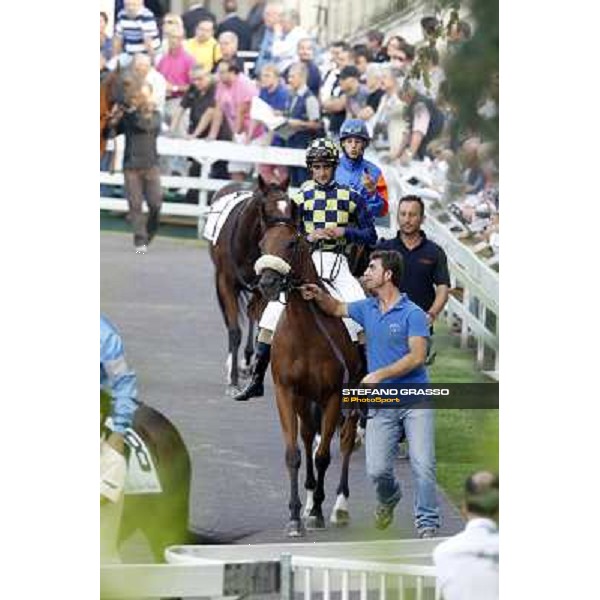 The horses parade before the race Milano - San Siro racetrack, 24th sept.2011 ph.Stefano Grasso