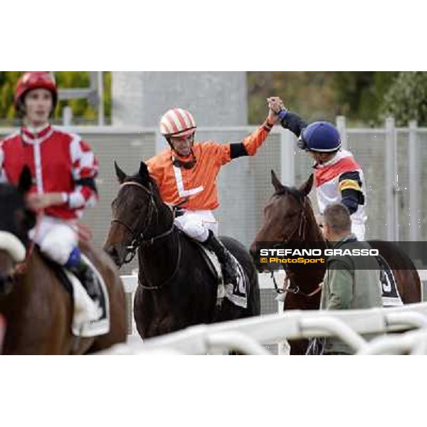 Mario Esposito on Tesey returns home after winning the Premio Conte Felice Scheibler and is congratulated by Umberto Rispoli Rome, 23rd oct. 2011 ph.Stefano Grasso