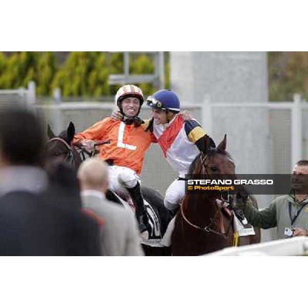 Mario Esposito on Tesey returns home after winning the Premio Conte Felice Scheibler and is congratulated by Umberto Rispoli Rome, 23rd oct. 2011 ph.Stefano Grasso