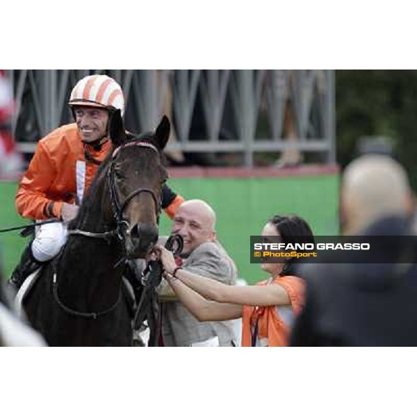 Mario Esposito on Tesey returns home after winning the Premio Conte Felice Scheibler and is congratulated by the owner Rome, 23rd oct. 2011 ph.Stefano Grasso