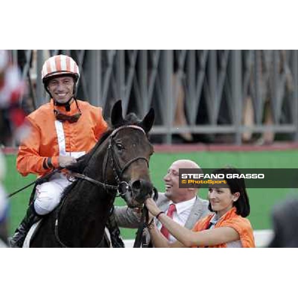 Mario Esposito on Tesey returns home after winning the Premio Conte Felice Scheibler and is congratulated by the owner Rome, 23rd oct. 2011 ph.Stefano Grasso