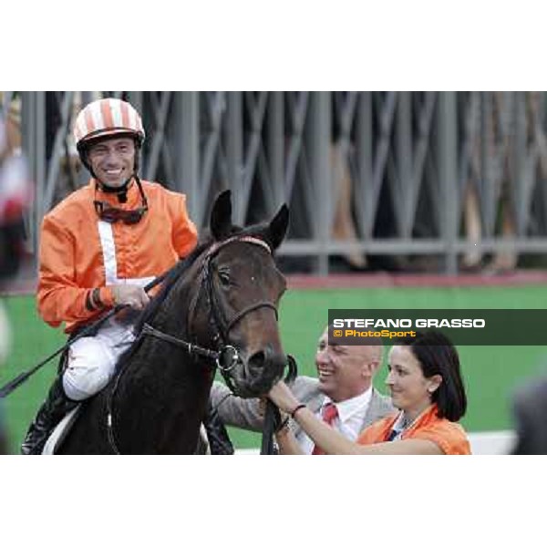 Mario Esposito on Tesey returns home after winning the Premio Conte Felice Scheibler and is congratulated by the owner Rome, 23rd oct. 2011 ph.Stefano Grasso