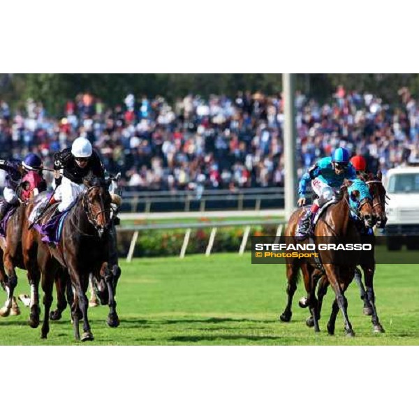 at last few meters to the line of Breeders\' Cup Filly and Mare Turf, Kieren Fallon and Oujia Board at left, fly towards the winning post. ph. Stefano Grasso