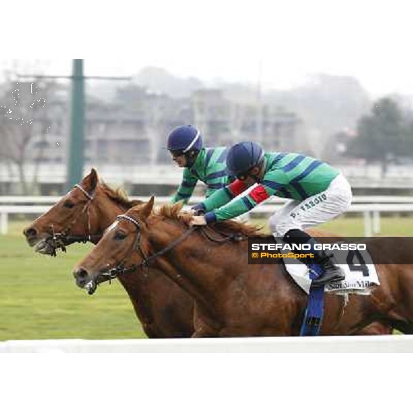 Marco Monteriso on Peccato di Gola wins the Premio Como beating Dario Vargiu on Salure Milano - San Siro racecourse,18th march 2012 ph.Stefano Grasso