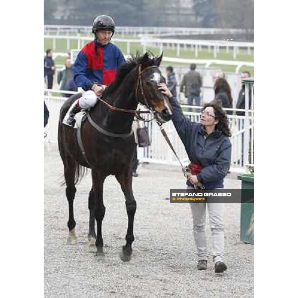 a caress to Silver Arrow after winning the Premio Busto Arsizio Milano - San Siro racecourse,18th march 2012 ph.Stefano Grasso