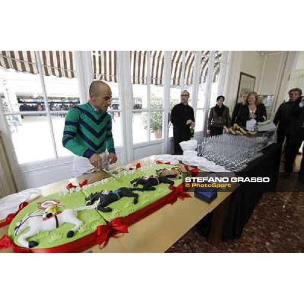 Dario Vargiu cutting the cake at the opening day at San Siro galopp Milano - San Siro racecourse,18th march 2012 ph.Stefano Grasso