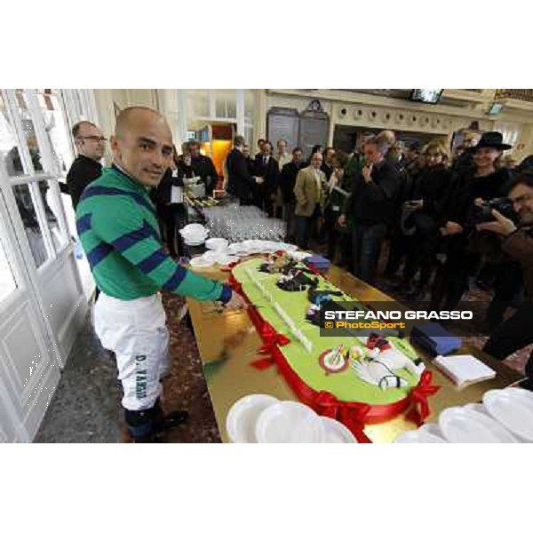 Dario Vargiu cutting the cake at the opening day at San Siro galopp Milano - San Siro racecourse,18th march 2012 ph.Stefano Grasso