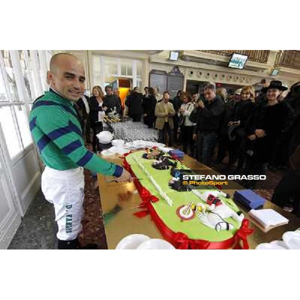 Dario Vargiu cutting the cake at the opening day at San Siro galopp Milano - San Siro racecourse,18th march 2012 ph.Stefano Grasso