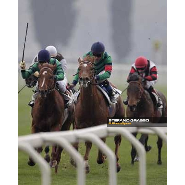 the straight of Premio Como - Marco Monteriso on Peccato di Gola and Dario Vargiu on Salure Milano - San Siro racecourse,18th march 2012 ph.Stefano Grasso