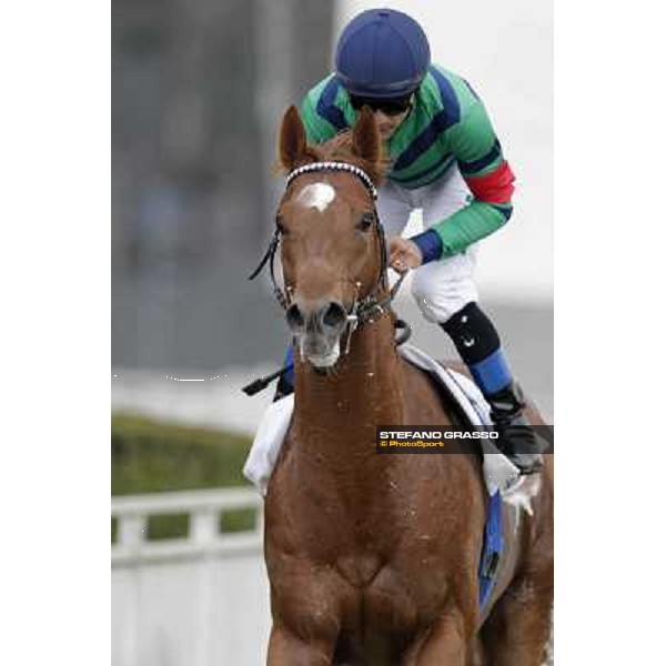 Dario Vargiu on Salure returns home after the race Milano - San Siro racecourse,18th march 2012 ph.Stefano Grasso