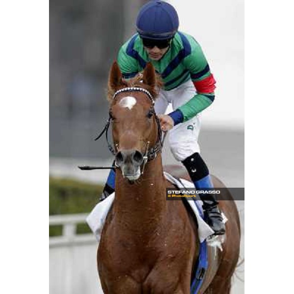 Dario Vargiu on Salure returns home after the race Milano - San Siro racecourse,18th march 2012 ph.Stefano Grasso