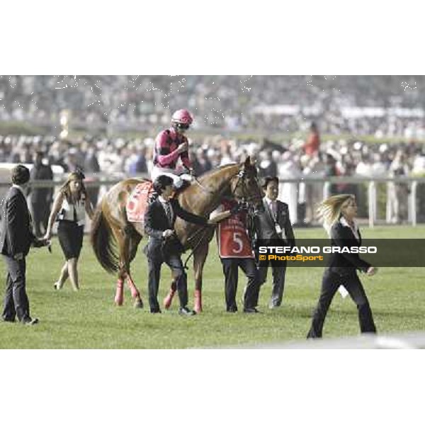 Yutaka Take on Smart Falcon before the start of the Dubai World Cup Dubai - Meydan racecourse 31st march 2012 ph.Stefano Grasso