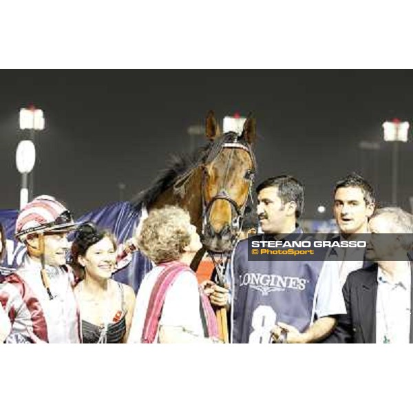 Corinne Barande Barbe kisses Cirrus des Aigles after winning the Dubai Sheema Classic Dubai World CupDubai - Meydan racecourse 31st march 2012ph.Stefano Grasso