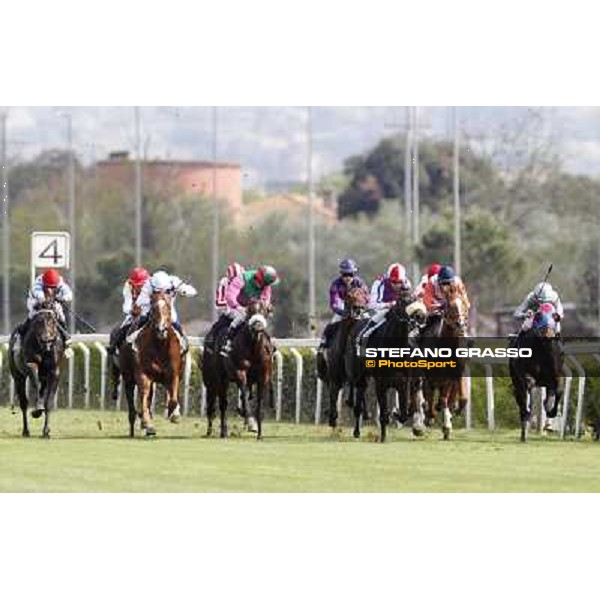 Claudio Colombi and Blu Constellation at the last 200 meters to the line . Fabio Branca on Airspace leads and goes to win the Premio Le Moss Rome, Capannelle racecourse, 6th april 2012 ph.Stefano Grasso