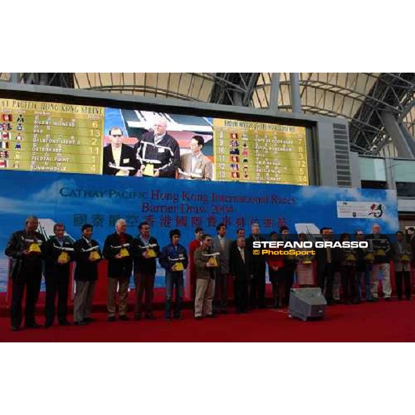 group photo of Cathat Pacific Hong Kong Sprint Barrier Draw at New Parade ring of Sha Tin racecourse Hong Kong 9th dec. 2004 ph. Stefano Grasso