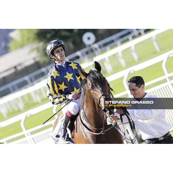 Fabio Branca on Malossol returns home after winning the Premio Gardone Milano - San Siro galopp racecourse, 8th april 2012 photo Stefano Grasso