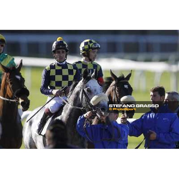 Fabio Branca on Crackerjack King and Claudio Colombi on Sward of Kings return home after the finish of the Premio DBS - Breeze Up Sale Milano - San Siro galopp racecourse, 8th april 2012 photo Stefano Grasso