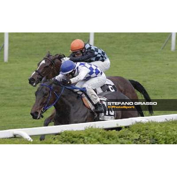 Cristian Demuro on Noble Hachy goes to win the Premio Carlo Chiesa. Salvatore Sulas on Malikayah is second Rome - Capannelle racecourse, 15th april 2012 photo Stefano Grasso