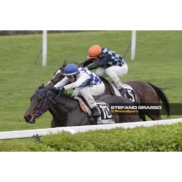 Cristian Demuro on Noble Hachy goes to win the Premio Carlo Chiesa. Salvatore Sulas on Malikayah is second Rome - Capannelle racecourse, 15th april 2012 photo Stefano Grasso