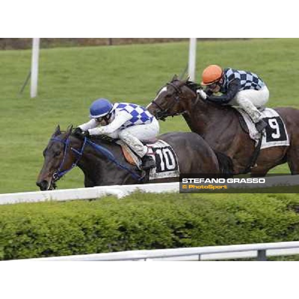 Cristian Demuro on Noble Hachy goes to win the Premio Carlo Chiesa. Salvatore Sulas on Malikayah is second Rome - Capannelle racecourse, 15th april 2012 photo Stefano Grasso