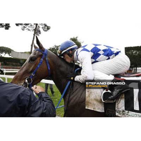 Cristian Demuro kisses Noble Hachy after winning the Premio Carlo Chiesa Rome - Capannelle racecourse, 15th april 2012 photo Stefano Grasso