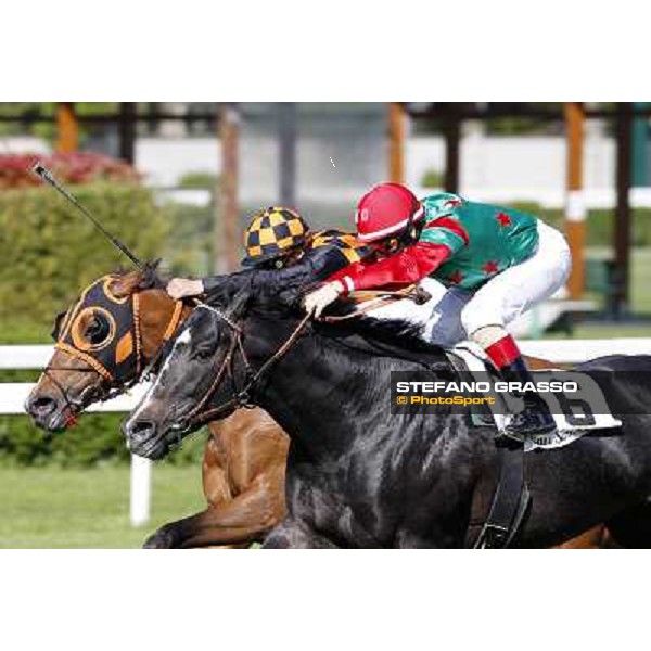 Mirco Demuro on Sopran Montieri (6) goes to win the Premio Rovato beating Gregorio Arena on Il Banchiere Milano - San Siro galopp racecourse, 22nd april 2012 ph.Stefano Grasso