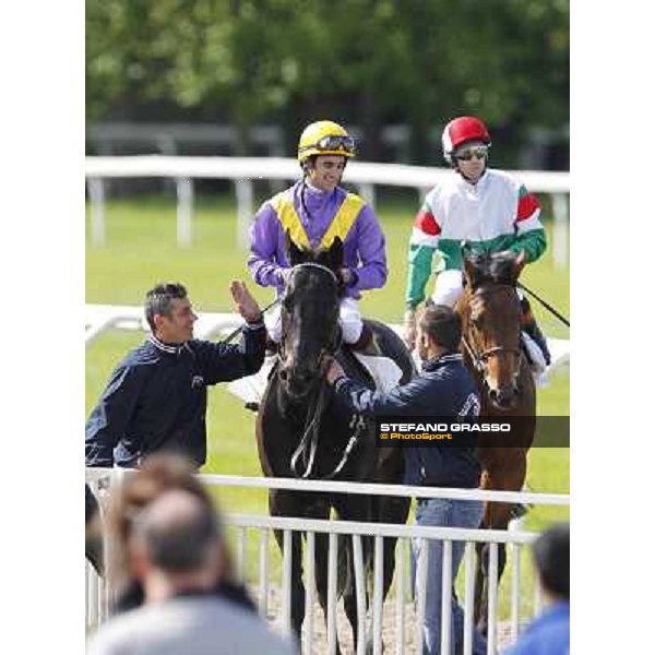 Fabio Branca returns home on Saratoga Black after winning the Premio Ambrosiano Milano - San Siro galopp racecourse, 22nd april 2012 ph.Stefano Grasso