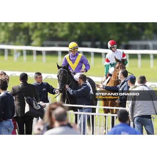 Fabio Branca returns home on Saratoga Black after winning the Premio Ambrosiano Milano - San Siro galopp racecourse, 22nd april 2012 ph.Stefano Grasso