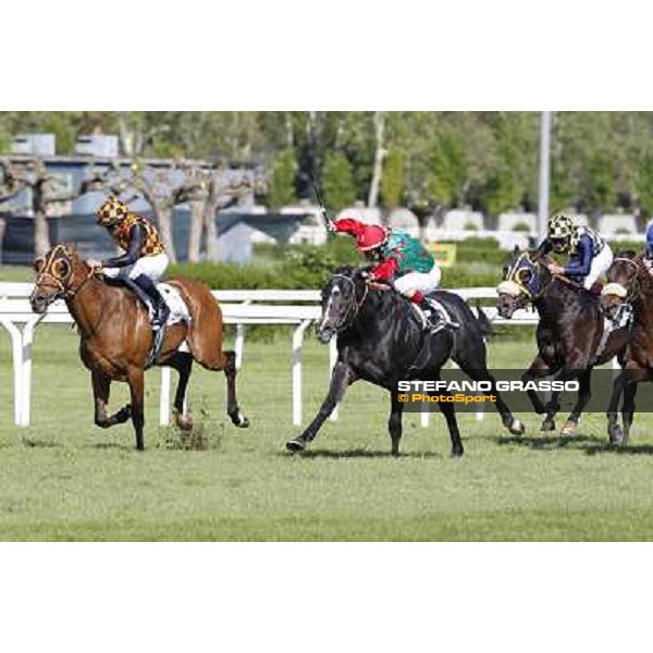 Mirco Demuro and Sopran Montieri go to win the Premio Rovato. Il Banchiere is second Milano - San Siro galopp racecourse, 22nd april 2012 photo Stefano Grasso