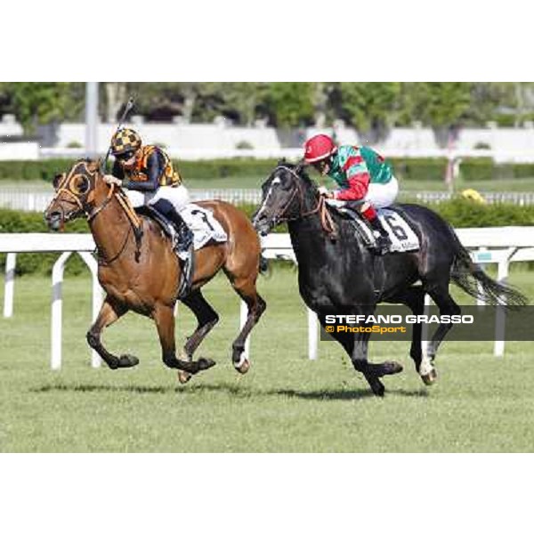 Mirco Demuro and Sopran Montieri go to win the Premio Rovato. Il Banchiere is second Milano - San Siro galopp racecourse, 22nd april 2012 photo Stefano Grasso