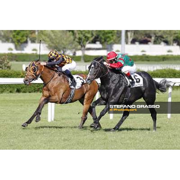 Mirco Demuro and Sopran Montieri go to win the Premio Rovato. Il Banchiere is second Milano - San Siro galopp racecourse, 22nd april 2012 photo Stefano Grasso