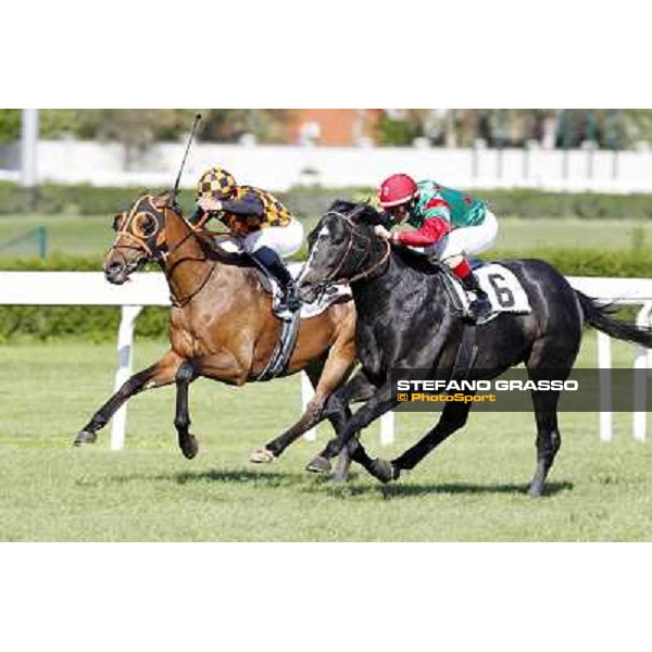 Mirco Demuro and Sopran Montieri go to win the Premio Rovato. Il Banchiere is second Milano - San Siro galopp racecourse, 22nd april 2012 photo Stefano Grasso