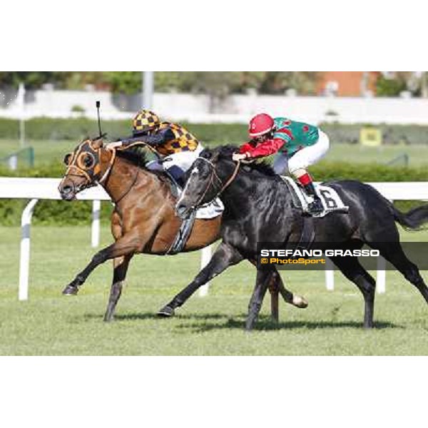 Mirco Demuro and Sopran Montieri go to win the Premio Rovato. Il Banchiere is second Milano - San Siro galopp racecourse, 22nd april 2012 photo Stefano Grasso