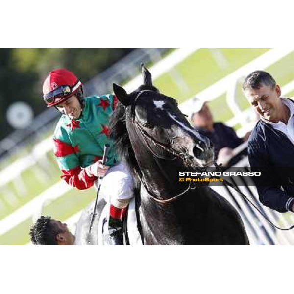 Mirco Demuro and Sopran Montieri return home after winning the Premio Rovato. Milano - San Siro galopp racecourse, 22nd april 2012 photo Stefano Grasso