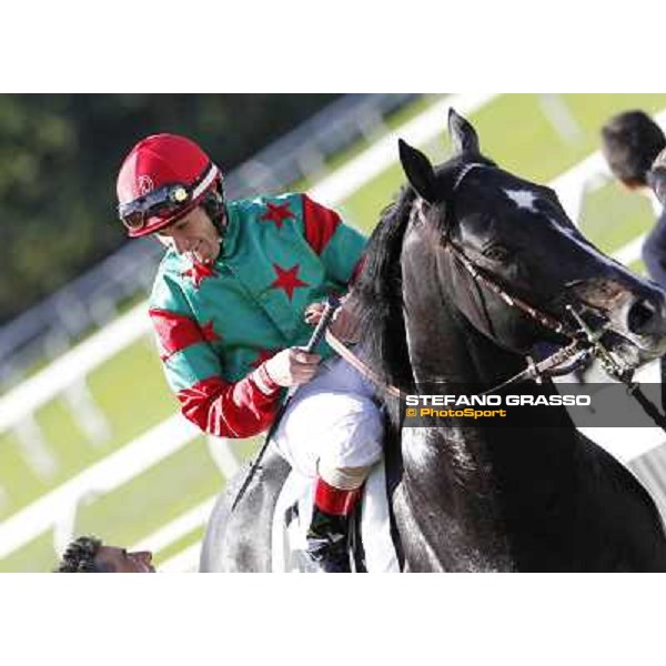 Mirco Demuro and Sopran Montieri return home after winning the Premio Rovato. Milano - San Siro galopp racecourse, 22nd april 2012 photo Stefano Grasso