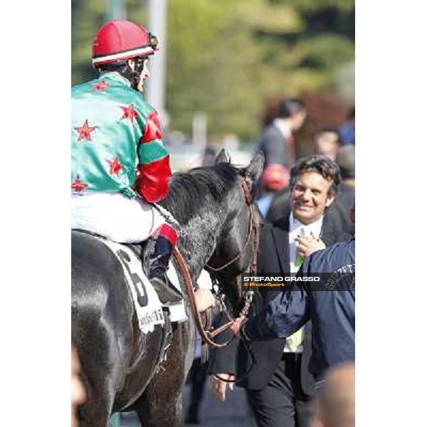 Mirco Demuro and Sopran Montieri return home after winning the Premio Rovato. Bruno Grizzetti in front of them Milano - San Siro galopp racecourse, 22nd april 2012 photo Stefano Grasso