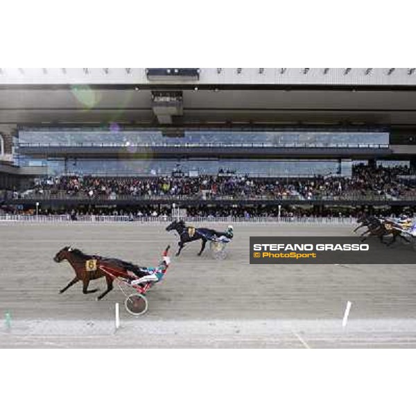 Pietro Gubellini throws the whip winning the Gran Premio d\'Europa with Owen Cr. Enrico Bellei with Obama Gar is second. Milan - San Siro trot racecourse, 25th april 2012 PH.Stefano Grasso